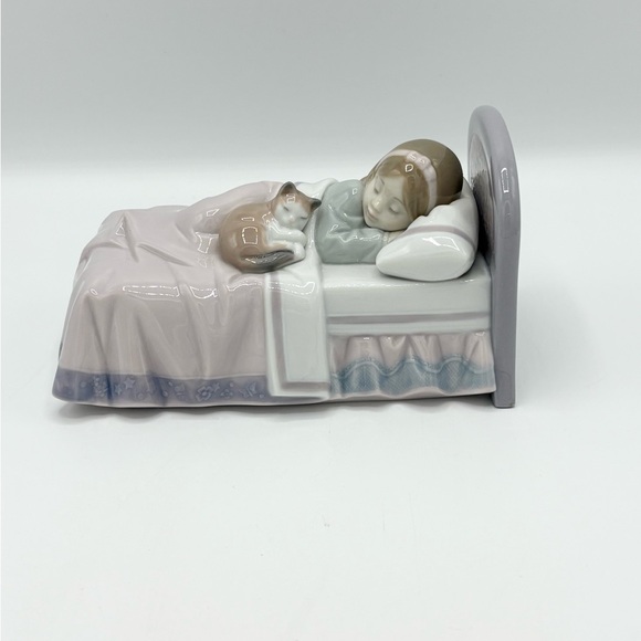 Sleeping Child and Cat Figurine